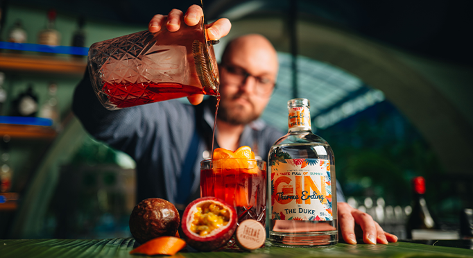 Bartender mixes a cocktail