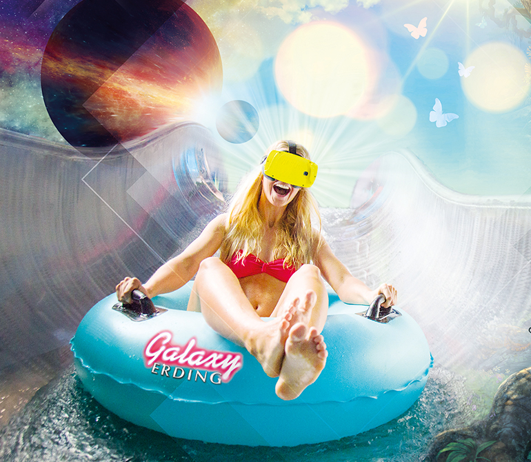 Woman wearing VR glasses slides on a tire.